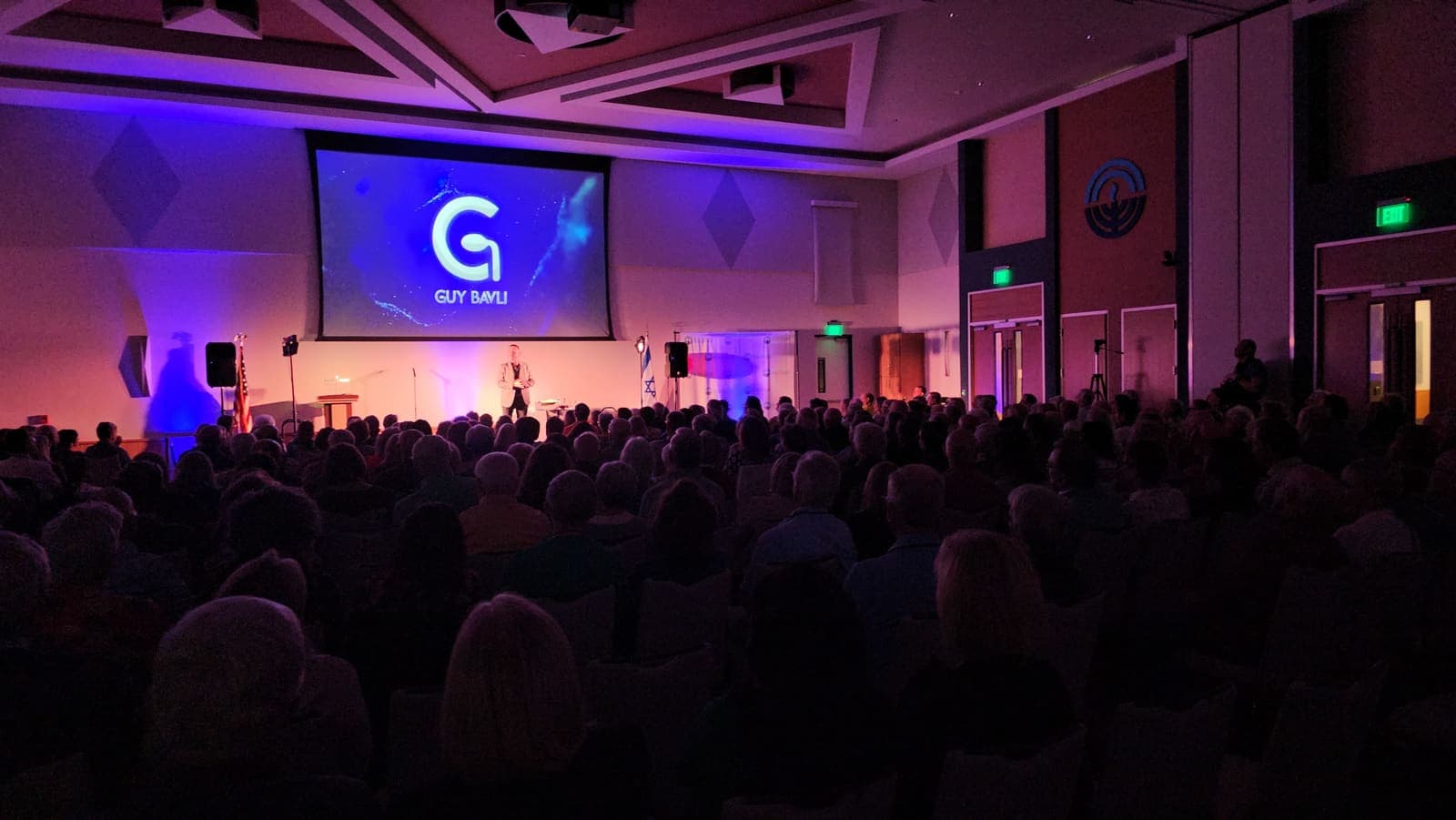 Guy Bavli speaking at a corporate conference