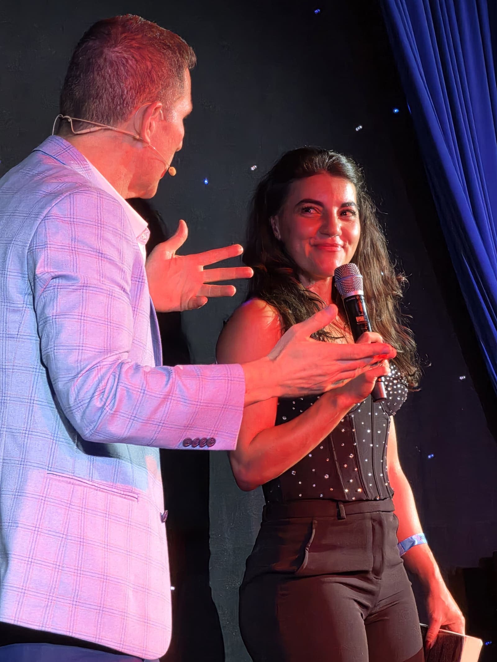 Guy Bavli mid-performance on a live stage